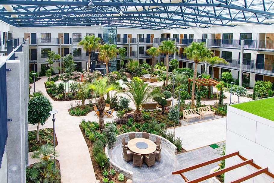 Eden Garden with greenery and communal areas under glass